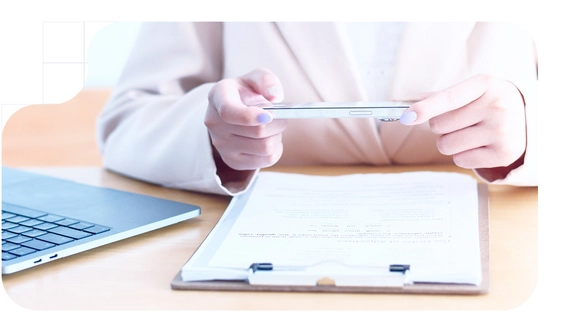 Woman scaning a paper document to digitize it