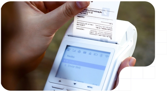 Man with a card reader printing a receipt