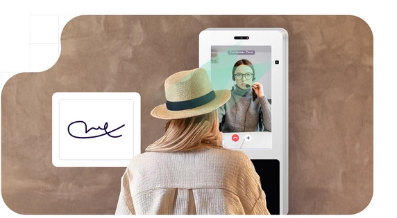 Women using an interactive kiosk with KYC