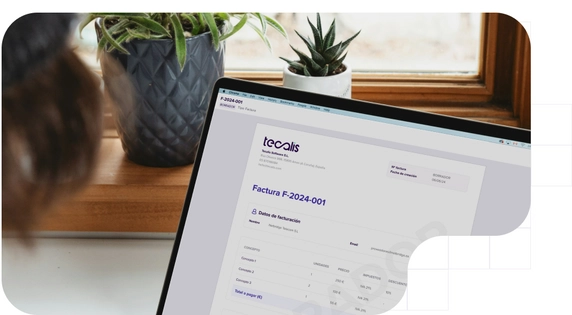 A view of a laptop screen displaying a draft digital invoice.