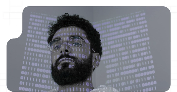 Binary code reflected on a man