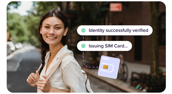 Woman using a self service kiosk for expending a sim card