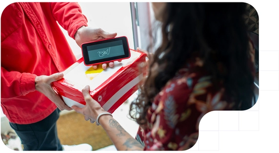 Woman using an electronic signature for a parcel in México