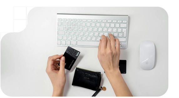 Woman entering her bank card details on a website, in accordance with European regulations such as DORA